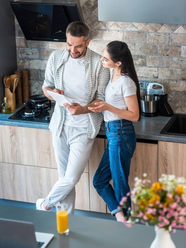 married-couple-using-digital-tablet-together-in-kitchen-smart-home-concept-1.jpg married-couple-using-digital-tablet-together-in-kitchen-smart-home-concept-1.jpg