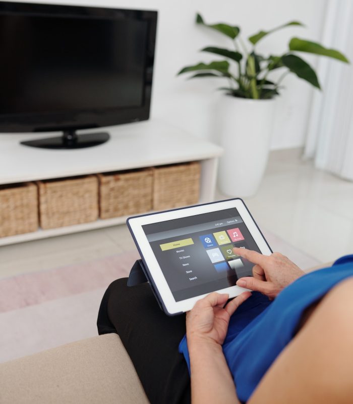 senior-woman-using-smart-home-app.jpg