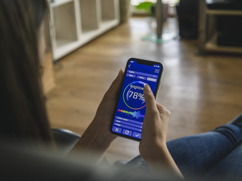 young-woman-with-smartphone-with-smart-home-control-functions.jpg young-woman-with-smartphone-with-smart-home-control-functions.jpg